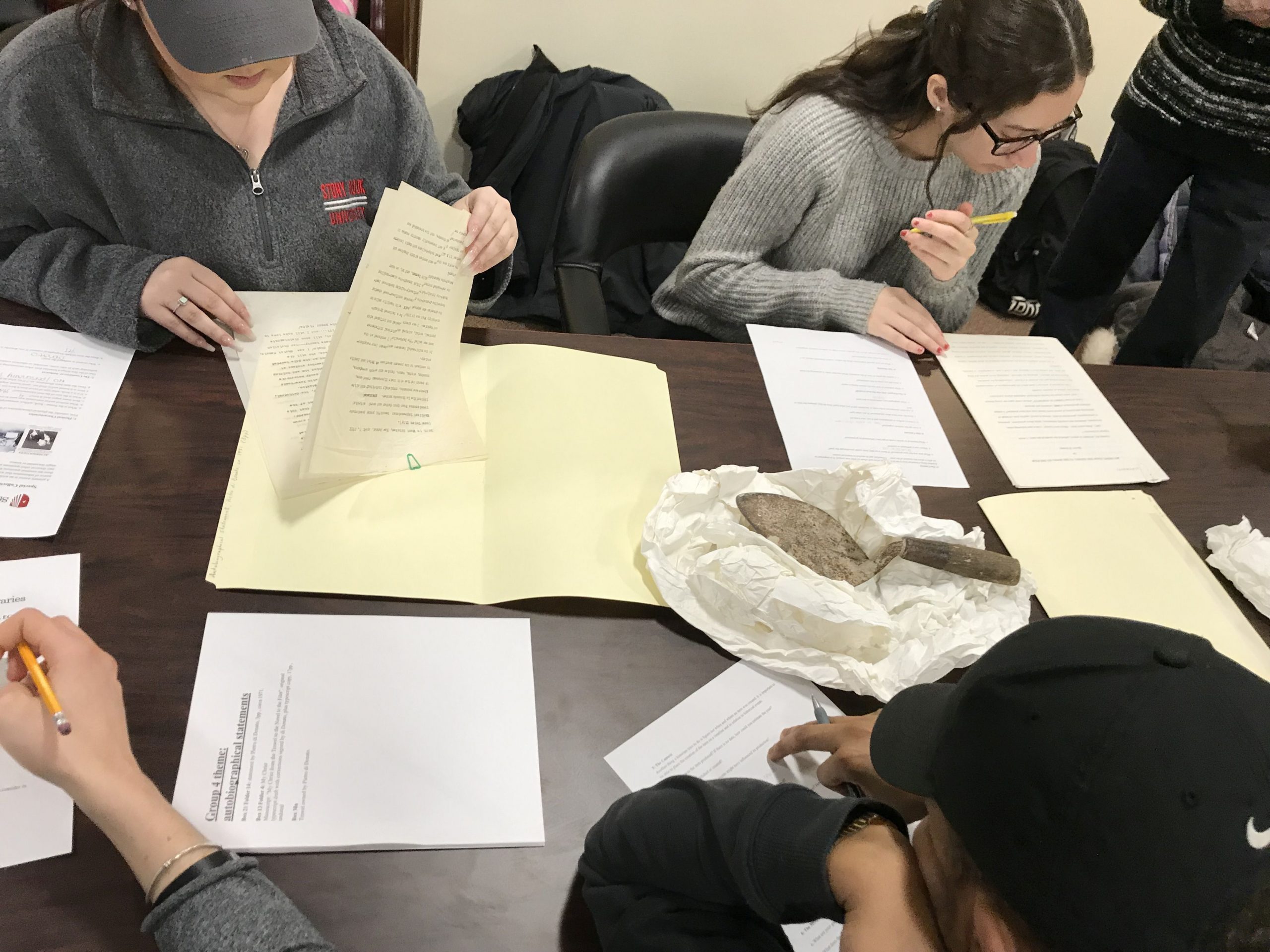 Students examining documents