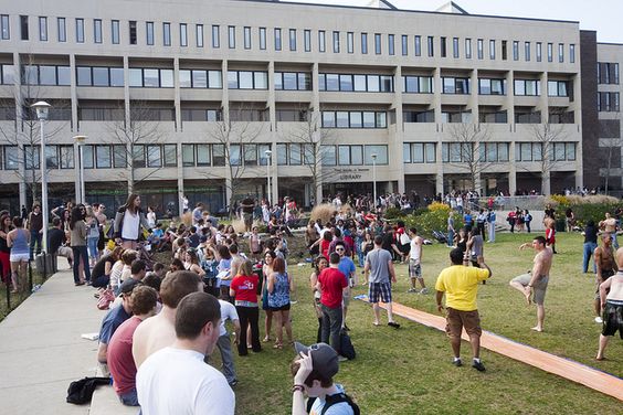 Exterior of the Melville Library with students